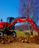 B95W - Excavator pe pneuri 